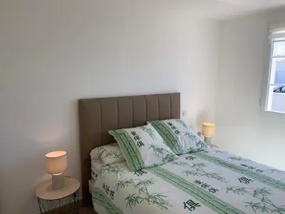 Un ou plusieurs lits dans un hébergement de l'établissement Maison 3 chambres, au calme, proche plage, fibre internet - FR-1-323-525