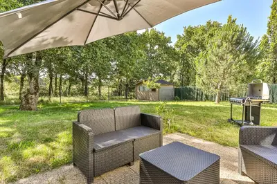 Jardin de l'établissement Les Pinsons - Jardin - Parking - Wifi