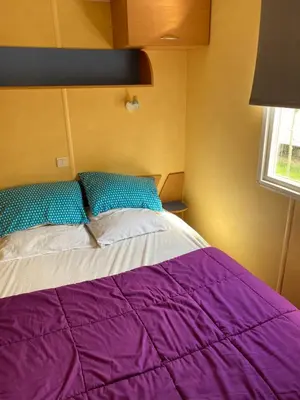 Un ou plusieurs lits dans un hébergement de l'établissement Mobil Home 5 personnes - Camping *** Les Ollivaud-