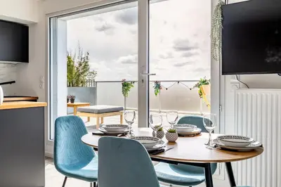 Télévision ou salle de divertissement dans l'établissement Le Crépuscule - Appartement terrasse et parking