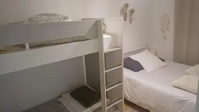 Un ou plusieurs lits dans un hébergement de l'établissement Mon coin de Paradis