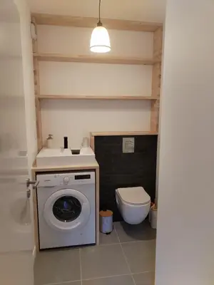 Salle de bains dans l'établissement Gites Le bois des Tréans