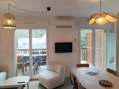 Télévision ou salle de divertissement dans l'établissement Gites Le bois des Tréans