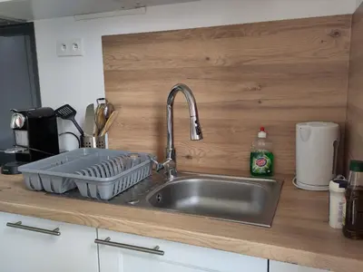 Cuisine ou kitchenette dans l'établissement Appartement lumineux et spacieux 70m2 proche de tout - 3 chambres