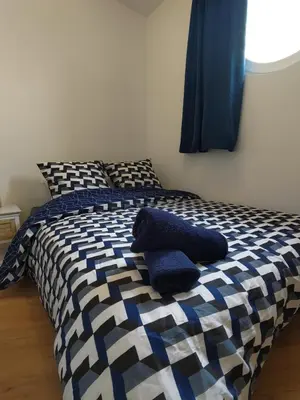 Un ou plusieurs lits dans un hébergement de l'établissement Appartement lumineux et spacieux 70m2 proche de tout - 3 chambres