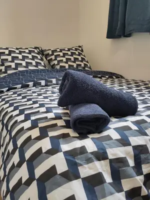 Un ou plusieurs lits dans un hébergement de l'établissement Appartement lumineux et spacieux 70m2 proche de tout - 3 chambres