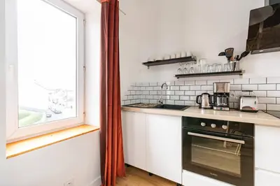 Cuisine ou kitchenette dans l'établissement Le Aristide - Centre Ville - Calme - Terrasse