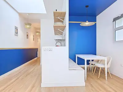 Coin salon dans l'établissement Appartement Le Porto