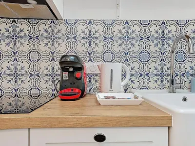 Cuisine ou kitchenette dans l'établissement Appartement Le Porto
