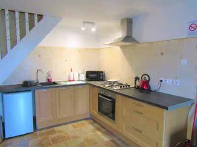 Cuisine ou kitchenette dans l'établissement Noyer