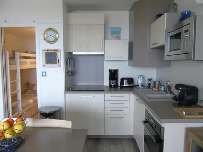 Cuisine ou kitchenette dans l'établissement Le Corsaire