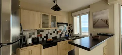 Cuisine ou kitchenette dans l'établissement Le Lido