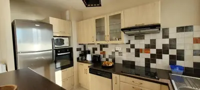 Cuisine ou kitchenette dans l'établissement Le Lido