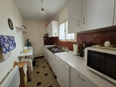 Cuisine ou kitchenette dans l'établissement Le Devallon
