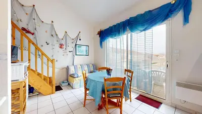 Coin salon dans l'établissement Le Jardin de la mer 150 plage