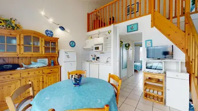 Cuisine ou kitchenette dans l'établissement Le Jardin de la mer 150 plage