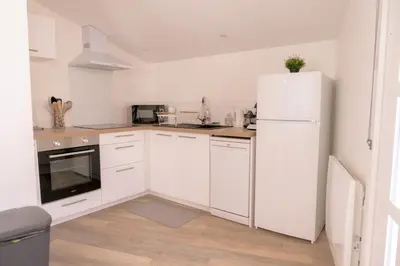 Cuisine ou kitchenette dans l'établissement La Vie En Gîte (Le Vintage)