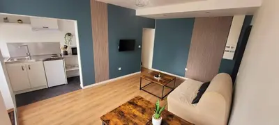 Cuisine ou kitchenette dans l'établissement Maison Cosy Rénovée - Puy du Fou