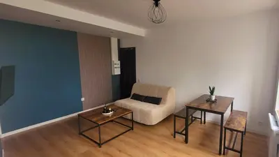 Coin salon dans l'établissement Maison Cosy Rénovée - Puy du Fou