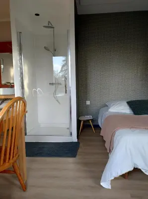 Un ou plusieurs lits dans un hébergement de l'établissement Studio et parking acces direct Nantes