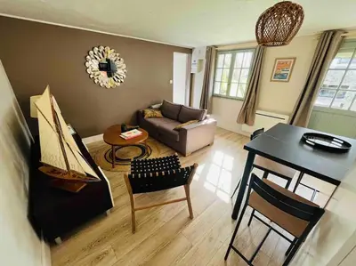 Coin salon dans l'établissement Maisonette Ti’calypso T2 - proche plage
