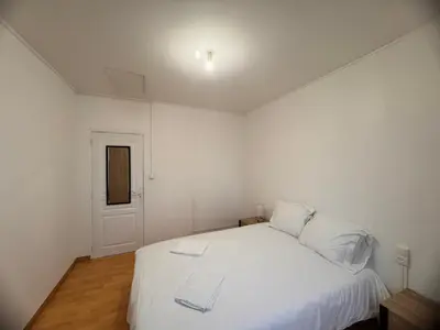Un ou plusieurs lits dans un hébergement de l'établissement Maison 8 pers -Au bon endroit - 12 min du Parc