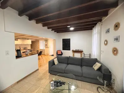 Cuisine ou kitchenette dans l'établissement Maison 8 pers -Au bon endroit - 12 min du Parc