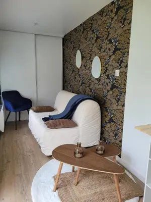 Coin salon dans l'établissement L'Home Had_oro