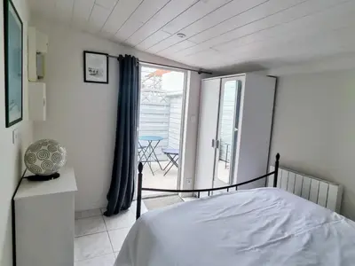 Un ou plusieurs lits dans un hébergement de l'établissement Pied-à-terre proche du centre et commodités
