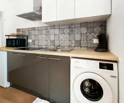 Cuisine ou kitchenette dans l'établissement T4 proche plage & commodités, vivez Saint Nazaire!