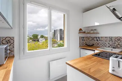 Cuisine ou kitchenette dans l'établissement Studio Cosy - Au pied du tram - Parking - WIFI