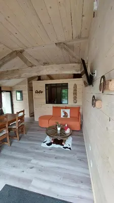Coin salon dans l'établissement L'orée du bois gaubau