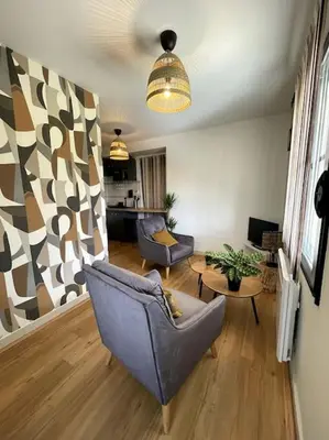 Coin salon dans l'établissement Appartement T2, 27 m2, rénové