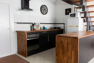 Cuisine ou kitchenette dans l'établissement Duplex la galerie