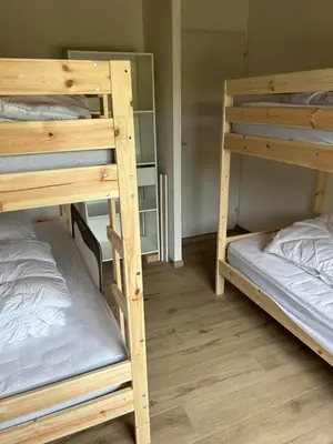 Un ou plusieurs lits dans un hébergement de l'établissement Maison proche de la mer