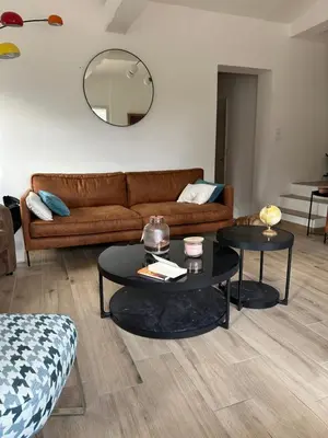 Coin salon dans l'établissement Maison proche de la mer