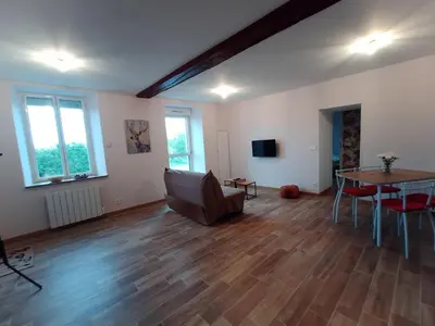 Télévision ou salle de divertissement dans l'établissement Maison a la Laiterie