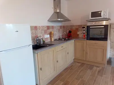 Cuisine ou kitchenette dans l'établissement Maison a la Laiterie