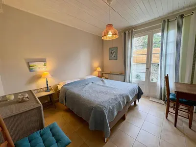 Un ou plusieurs lits dans un hébergement de l'établissement Charmante maison 5 pers, Wi-Fi, proche plage - FR-1-323-537