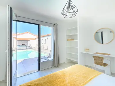 Un ou plusieurs lits dans un hébergement de l'établissement Villa Charme de la Blancharderie by Interhome
