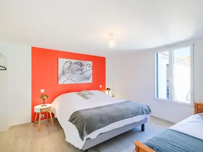 Un ou plusieurs lits dans un hébergement de l'établissement Villa Charme de la Blancharderie by Interhome