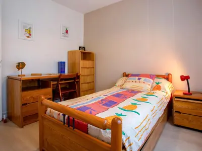 Un ou plusieurs lits dans un hébergement de l'établissement Apartment Le Bellevue by Interhome