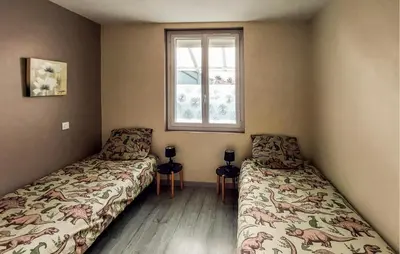 Un ou plusieurs lits dans un hébergement de l'établissement Awesome Home In Saint-Michel-Chef-Chef