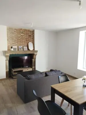 Coin salon dans l'établissement Gîte des Trois Cantons