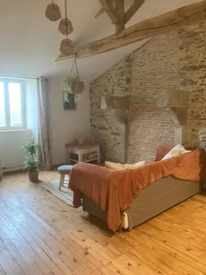Un ou plusieurs lits dans un hébergement de l'établissement Premier étage d une jolie maison à la campagne