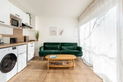 Cuisine ou kitchenette dans l'établissement Le Noyer - appartement moderne & accessible