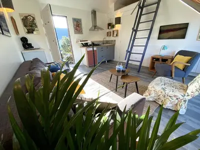 Coin salon dans l'établissement Jolie maison pleine nature, 1-4 p, parking gratuit