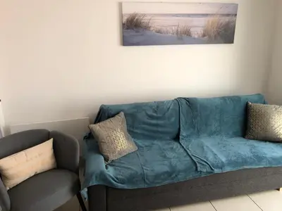 Coin salon dans l'établissement Maison rénovée à 300m de la mer