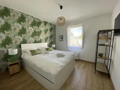 Un ou plusieurs lits dans un hébergement de l'établissement Maison proche du centre Pornic