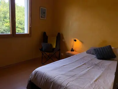 Un ou plusieurs lits dans un hébergement de l'établissement Chambre 